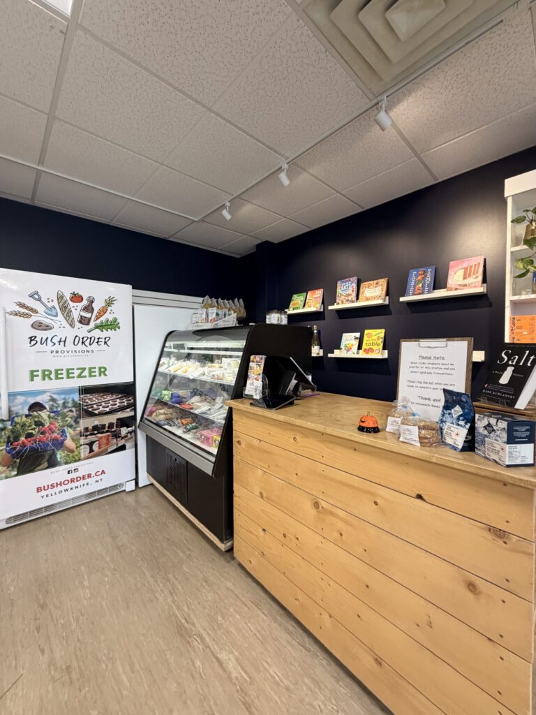 The Pantry counter with its cheese case and the Bush Order freezer